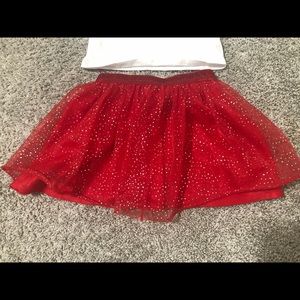 Christmas red sparkly skirt. Sparkles do not come off :)